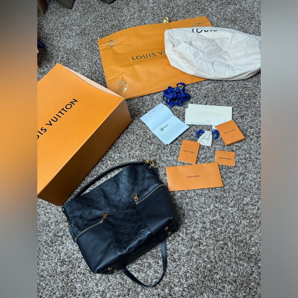 melie m empreinte louis vuitton black Handbag